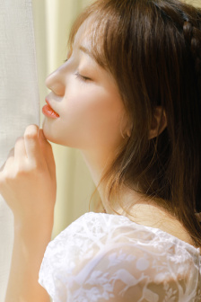 田丸麻纪子